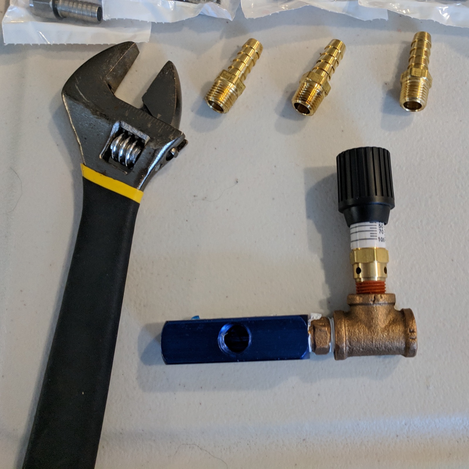 Attaching the manifold to the tee