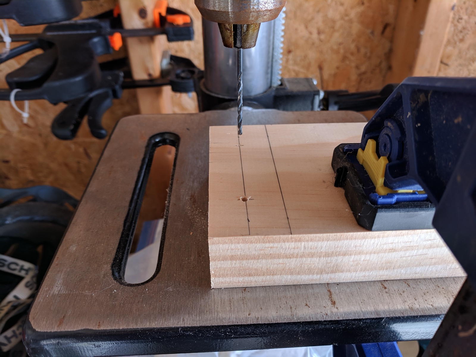 Drilling pilot holes for the screws.